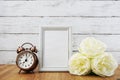 Vintage alarm clock and space photo frame Royalty Free Stock Photo