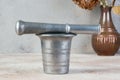 Vintage aluminum mortar with pestle Royalty Free Stock Photo