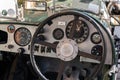 Vintage Alvis oldsmobile veteran car standing on street