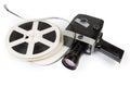 Vintage amateur movie camera and reels of Super 8mm films