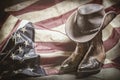 Vintage american flag, cowboy hat and boots, independence or memorial day concept Royalty Free Stock Photo