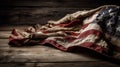 Vintage American flag crumpled on wooden background. Royalty Free Stock Photo