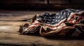 Vintage American flag crumpled on wooden background. Royalty Free Stock Photo