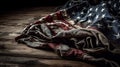 Vintage American flag crumpled on wooden background. Royalty Free Stock Photo