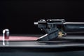 DJ turntable for vinyl records, cartridge on tonearm and space for text. Royalty Free Stock Photo