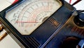 Vintage old analog volt meter scale of measurement device,selective focus Royalty Free Stock Photo