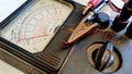 Vintage old analog volt meter scale of measurement device,selective focus Royalty Free Stock Photo