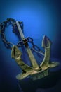 Vintage Anchor on a blue background studio shot