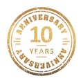 Vintage anniversary 10 year round grunge round stamp. Retro styled vector illustration.