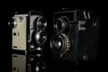 Vintage antique camera isolated on black glass Royalty Free Stock Photo