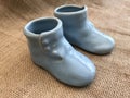Vintage Antique Ceramic Pottery Blue Button-up Baby Shoe Planters - Nursery Decor Royalty Free Stock Photo