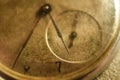 Vintage antique dirty pocket watch with yellowed dial and rusty hands. Clock grunge. Royalty Free Stock Photo