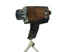 Vintage antique film movie camera isolated on white background Royalty Free Stock Photo