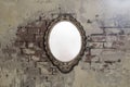 Vintage antique mirror on old brick wall background texture Royalty Free Stock Photo