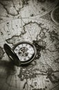 Vintage antique pocket watch on old map background Royalty Free Stock Photo