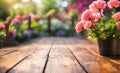 Empty wooden vintage table board on spring flower garden bokeh background. Royalty Free Stock Photo