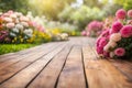 Empty wooden vintage table board on spring flower bokeh background. Royalty Free Stock Photo