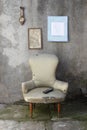 Vintage armchair and modern remote control