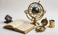 Vintage astronomy tools, open book and armillary sphere representing knowledge and discovery. Royalty Free Stock Photo