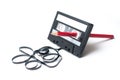 vintage audio cassette with magnetic band outside rew Royalty Free Stock Photo