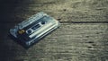 Vintage audio cassette tapes on wooden background. Royalty Free Stock Photo