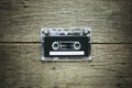 Vintage audio cassette tapes on wooden background. Royalty Free Stock Photo