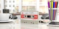 Vintage audio cassette, text mix tape on the label, on an office desk. 3d illustration Royalty Free Stock Photo