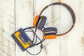 Vintage audio cassettes and headphones over a black chalkboard Royalty Free Stock Photo