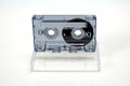 Vintage audio compact cassette. Cassette on a white background, front view with box Royalty Free Stock Photo