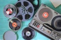 Vintage audio reel to reel tape recorder and magnetic recording tapes, flat lay Royalty Free Stock Photo