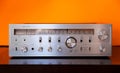 Vintage Audio Stereo Receiver with shiny metal front panel Royalty Free Stock Photo