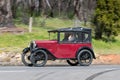 Vintage 1930 Austin 7 Chummy Tourer driving on country road