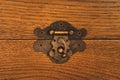 Vintage authentic brass antique castle latch on a makeshift oak wooden box