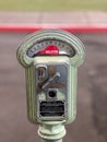 Vintage authentic parking meter on city street Royalty Free Stock Photo