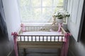 Vintage baby cot in old rural house