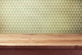 Vintage background with empty wooden table over wallpaper Royalty Free Stock Photo