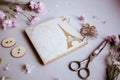 Vintage background, hand made. Old scissors, ribbons, wooden buttons, a notebook for text and flowers