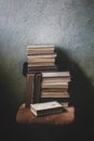 Vintage Background with Old Books. Stack of Books Folded on a Chair. Fragments of the Interior of the Old Library Royalty Free Stock Photo