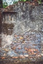 Vintage background old bricks wall texture with old plaster and Royalty Free Stock Photo