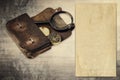 Vintage background with old paper and wallet Royalty Free Stock Photo