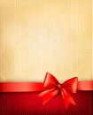 Vintage background with red gift bow and ribbon Royalty Free Stock Photo