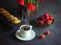 Vintage background with red poppies in a wooden vase, a cup of coffee, strawberries in a plate and croissants on a wooden tray Royalty Free Stock Photo