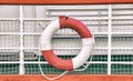 Vintage background with rescue circle on boat. Lifebuoy is mounted on a ship Royalty Free Stock Photo