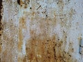 Vintage background with rusty iron sheet with shabby faded blue paint closeup, rough textured surface old metal material Royalty Free Stock Photo