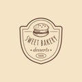 Vintage bakery logo. Vector typographic poster with macaron. Retro emblem sweet cookie. Biscuit sign. Desert emblem. Royalty Free Stock Photo