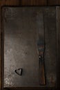 Vintage Baking utensils - spatula and heart shape cutter Royalty Free Stock Photo