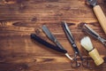 Vintage barber shop tools on the wood background Royalty Free Stock Photo