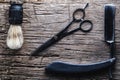 Vintage barber shop tools on wooden background. Masculine, flat lay, top view. Horizontal