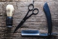 Vintage barber shop tools on wooden background. Masculine, flat lay, top view. Horizontal