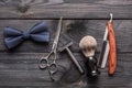 Vintage barber shop tools on wooden background Royalty Free Stock Photo